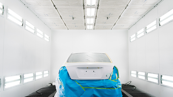 car in a spray paint booth